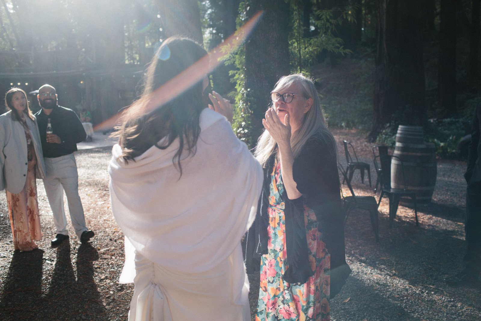 Mother and bride during cocktail hour in Mendocino
