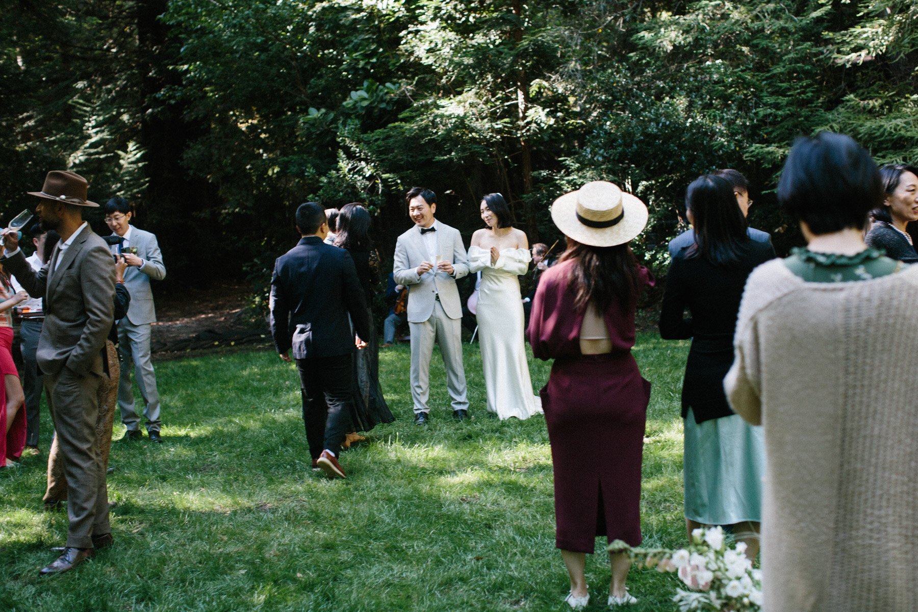 Cocktail hour on the lawn of the redwood grove at Glen Oaks Big Sur