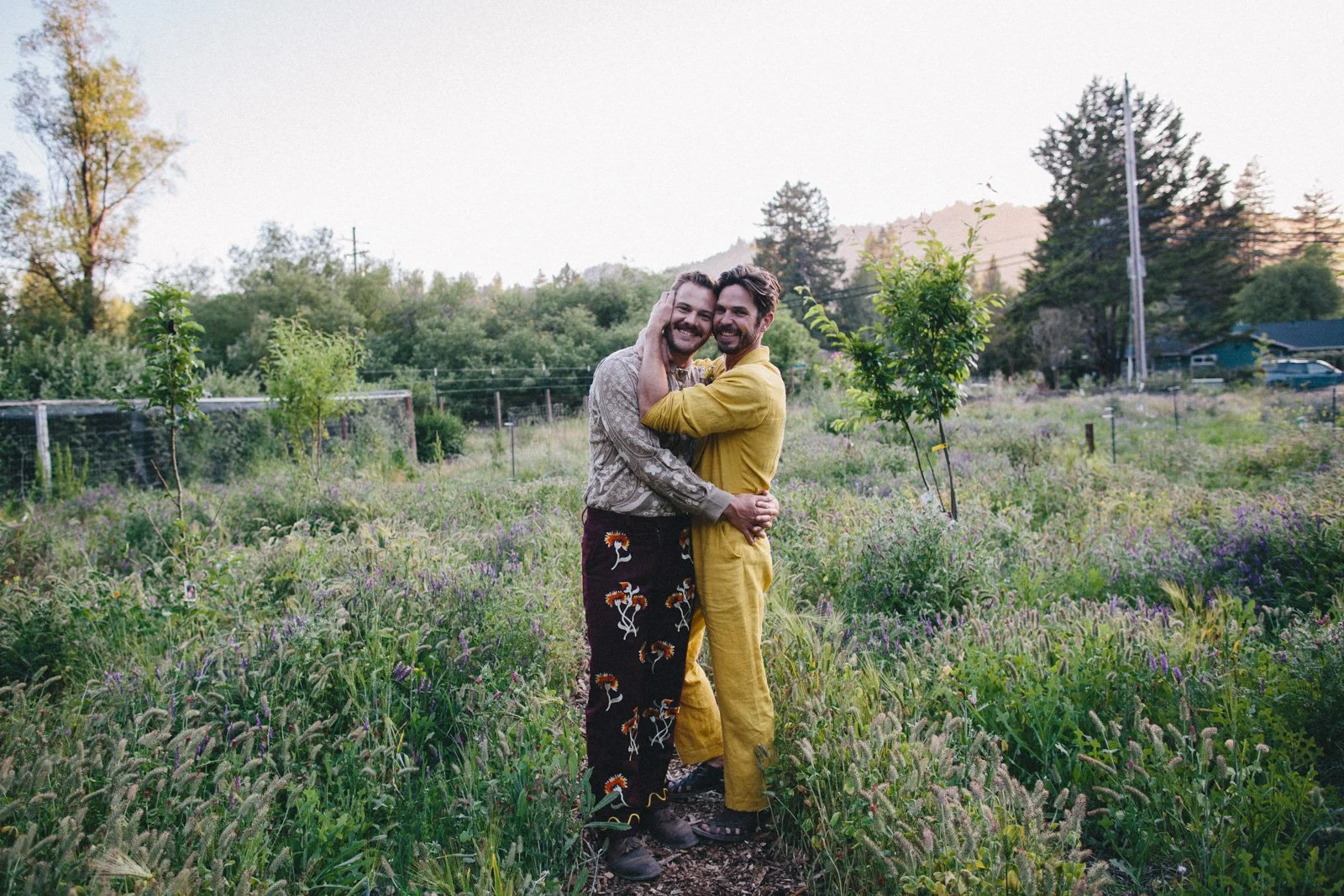Grooms at their wedding reception at Solar Punk Farms
