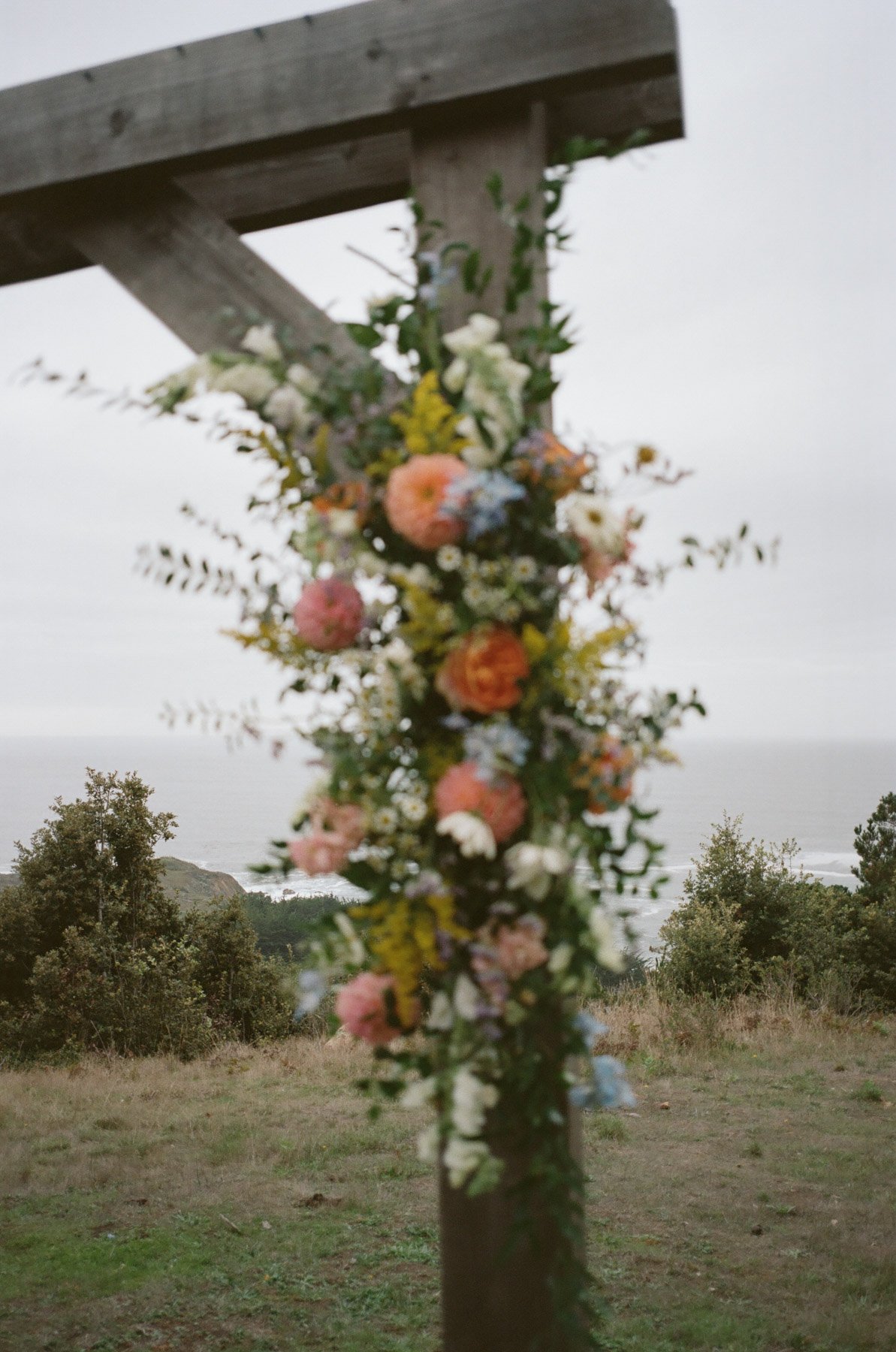 Wedding floral overlooking the Pacific Ocean at Driftwood Lodge
