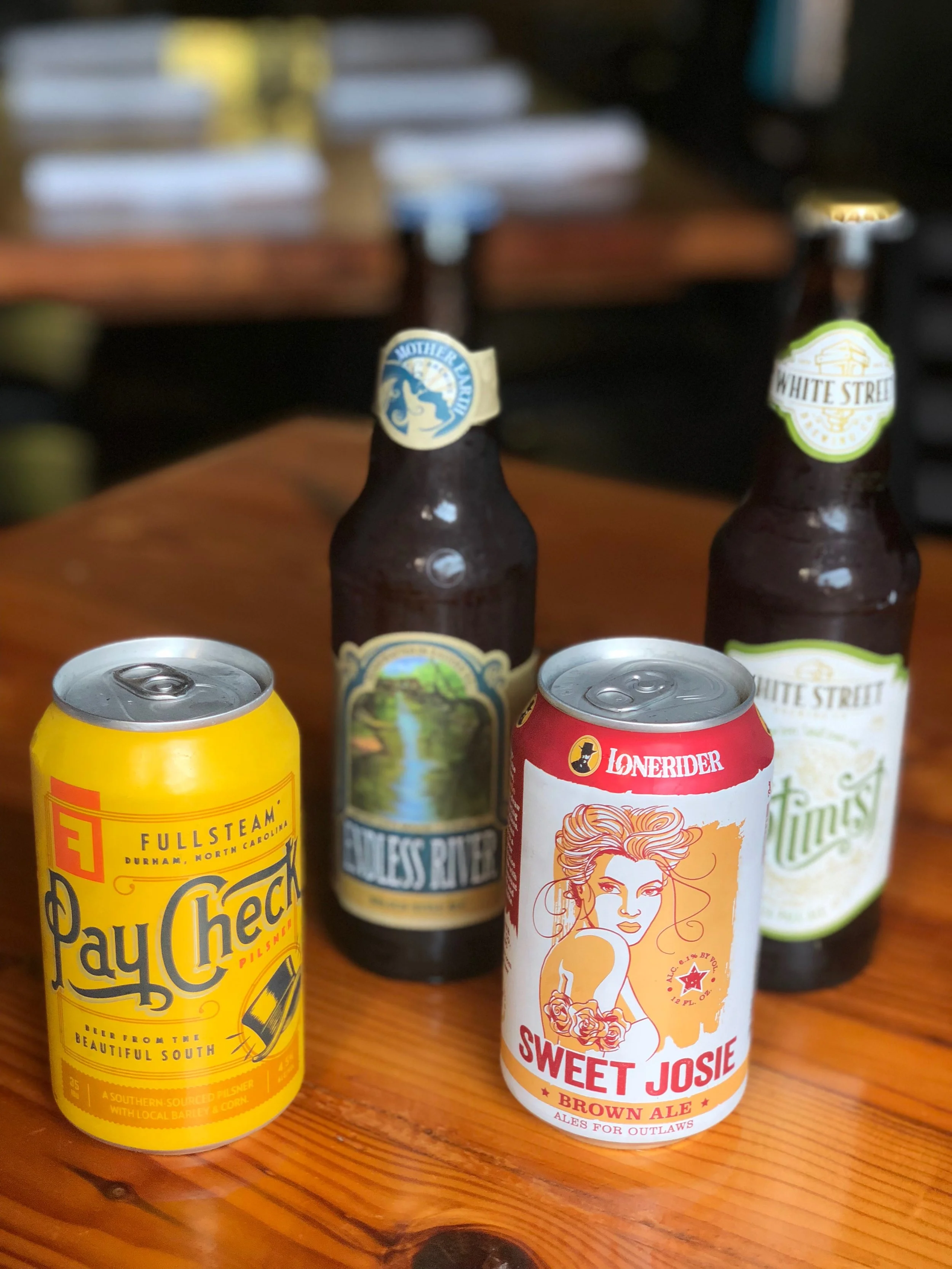 Some of the delicious NC beers that will accompany June's vegan dinner