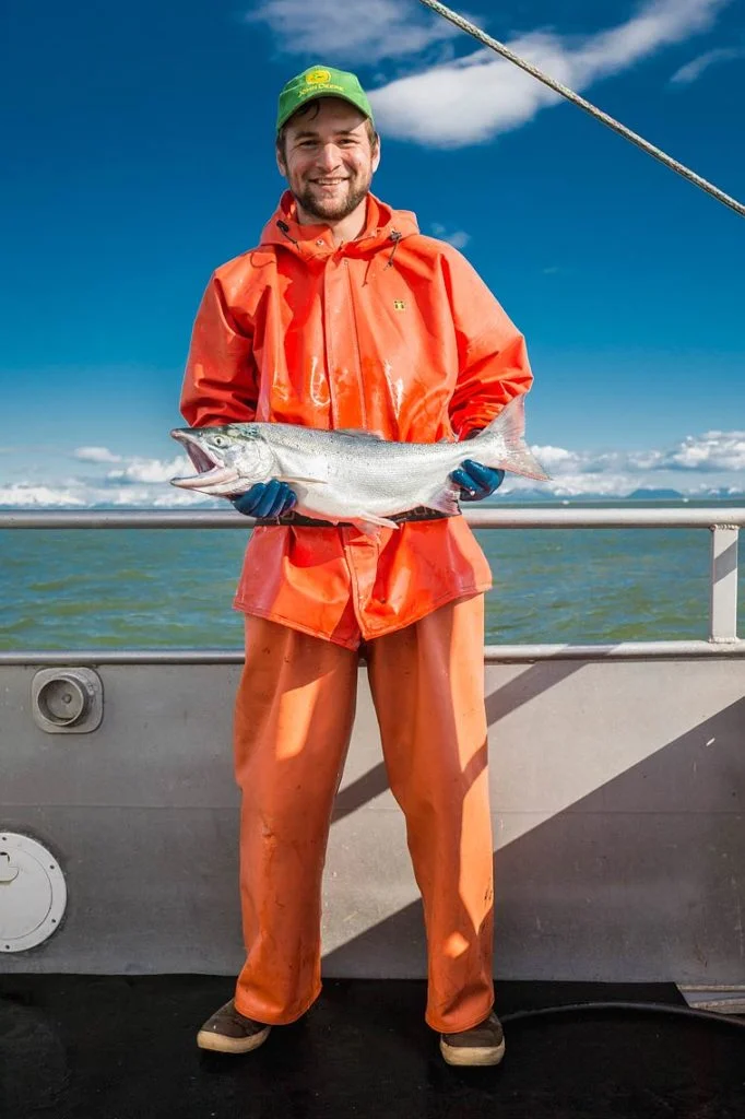 Alex Stewart, Portland, OR, holds a sockeye.