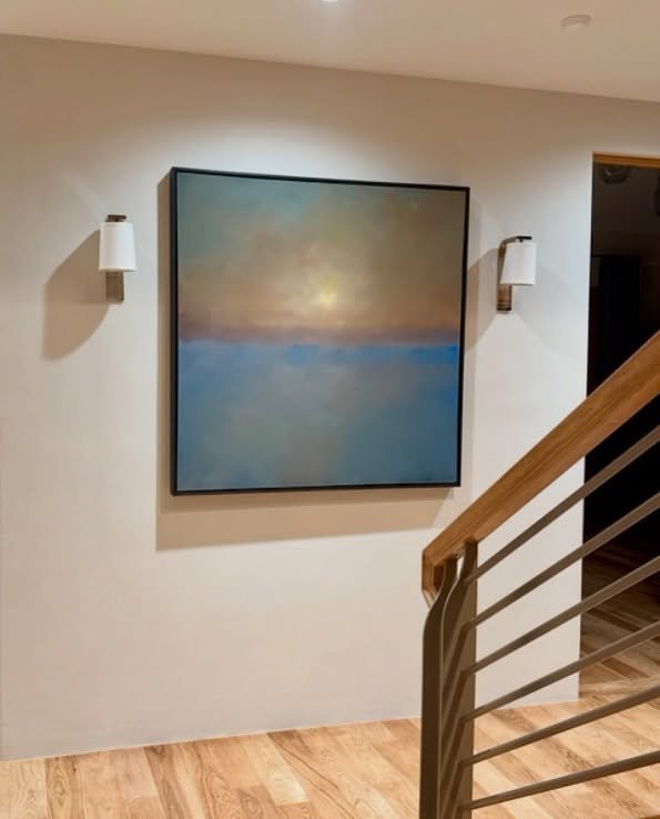 How about a beautiful painting by @patriciamarkosdolan greeting you at the bottom of the stairs?  What a perfect spot for a gorgeous piece of art! 

#Installationshot #ArtinDesign #Abstractlandscapeart #mutedcolors #skyart