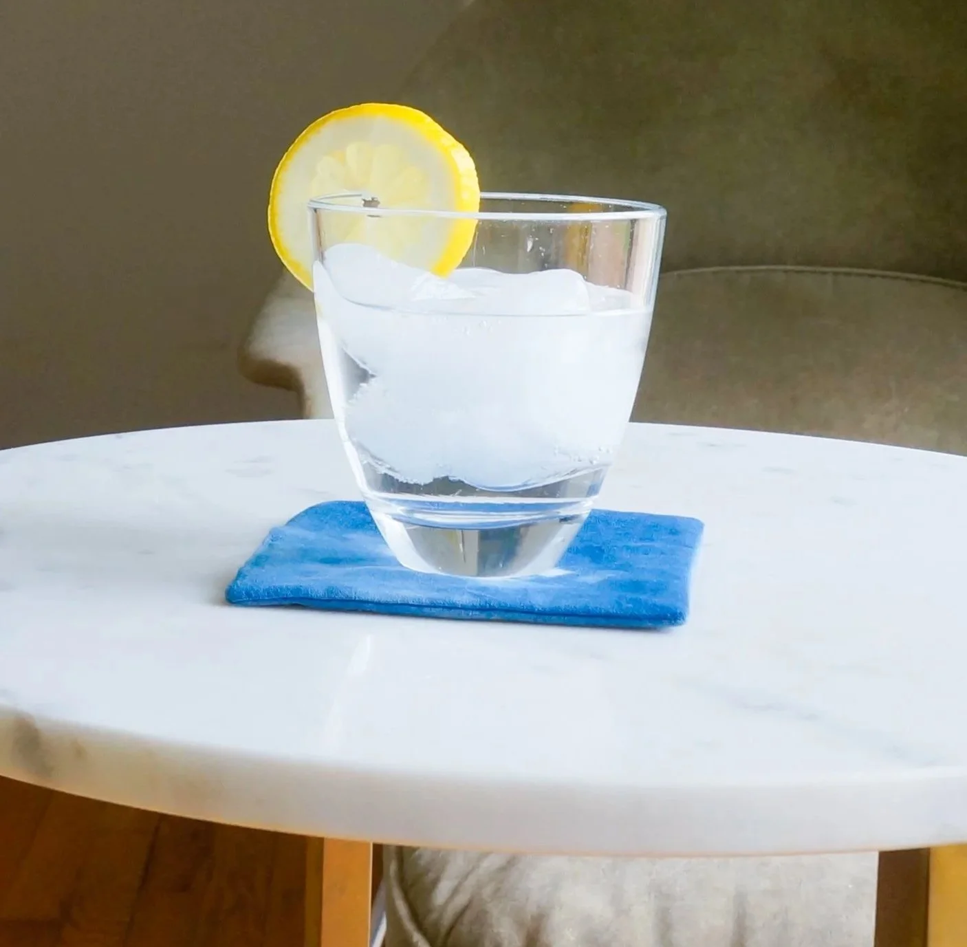 cold cocktail on an indigo coaster