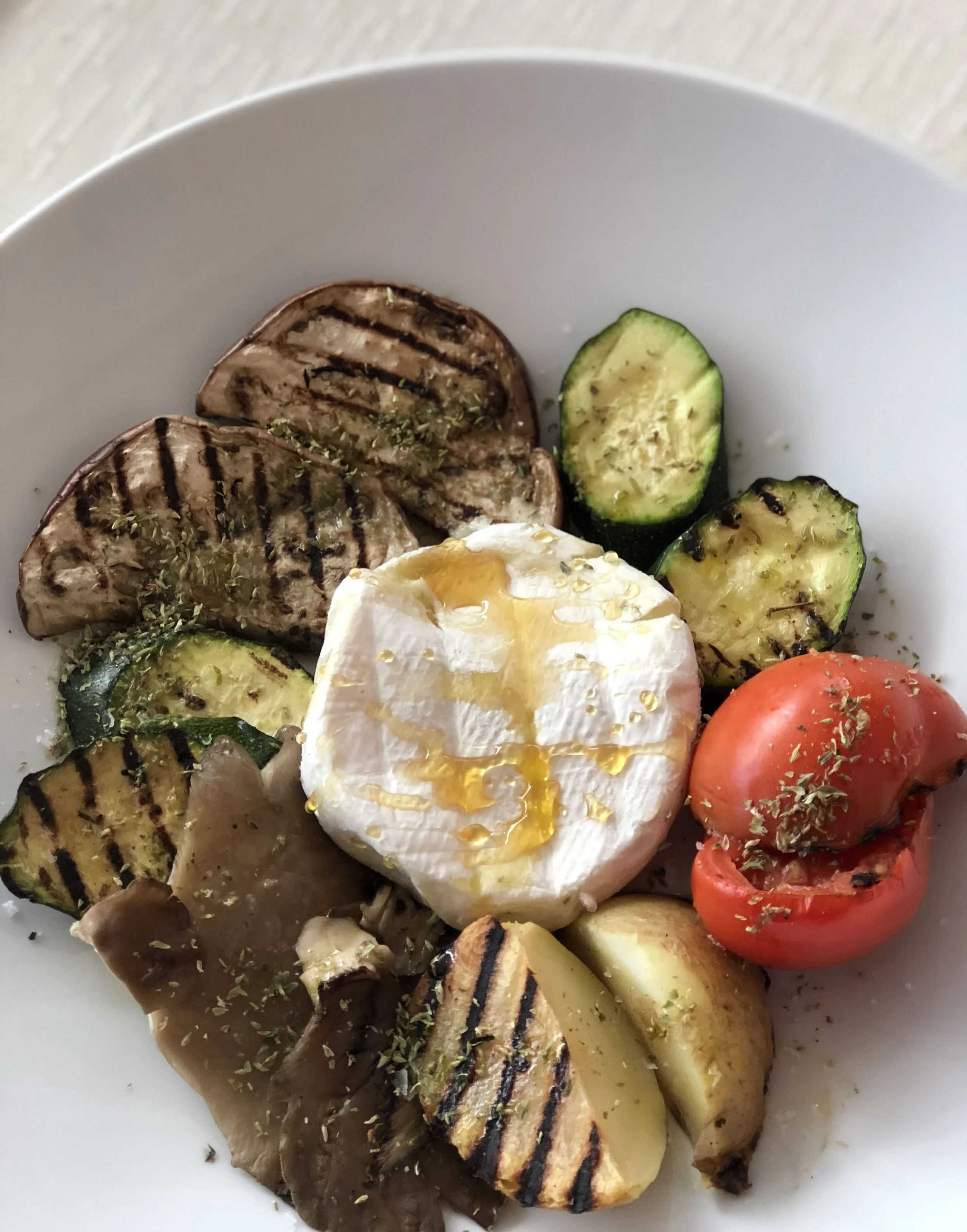 This roasted vegetable and cheese plate with honey and oregano (and potato!) at Galleria Restaurant in Cefalu has inspired a similar dish in my upcoming book.