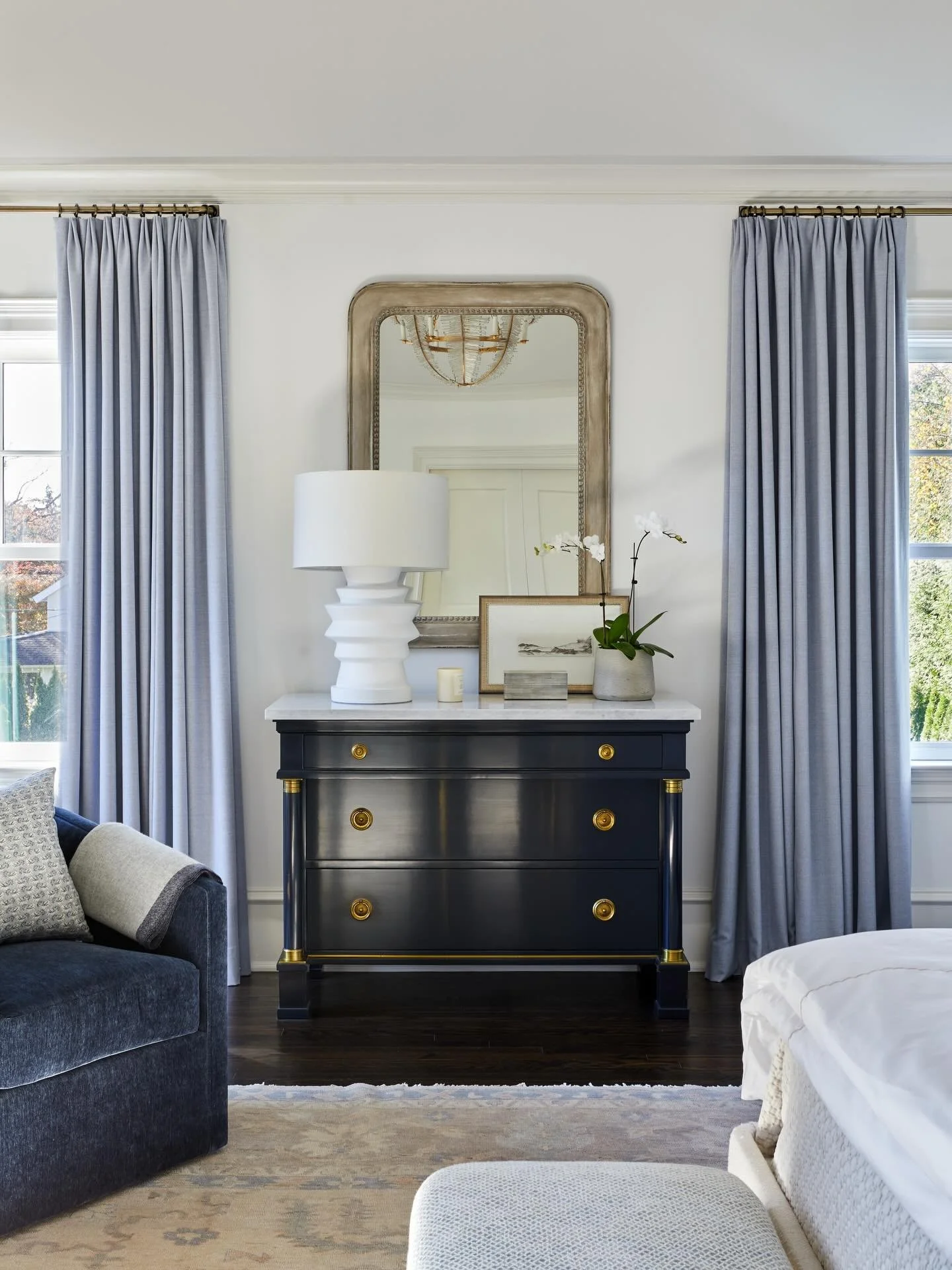 I love this image because it&rsquo;s a reminder to shop your closet. The client&rsquo;s chest, lamp and chair were existing when we started this primary bedroom design and easily layered with new furnishings and fabrics. Frankly, I may not have even 