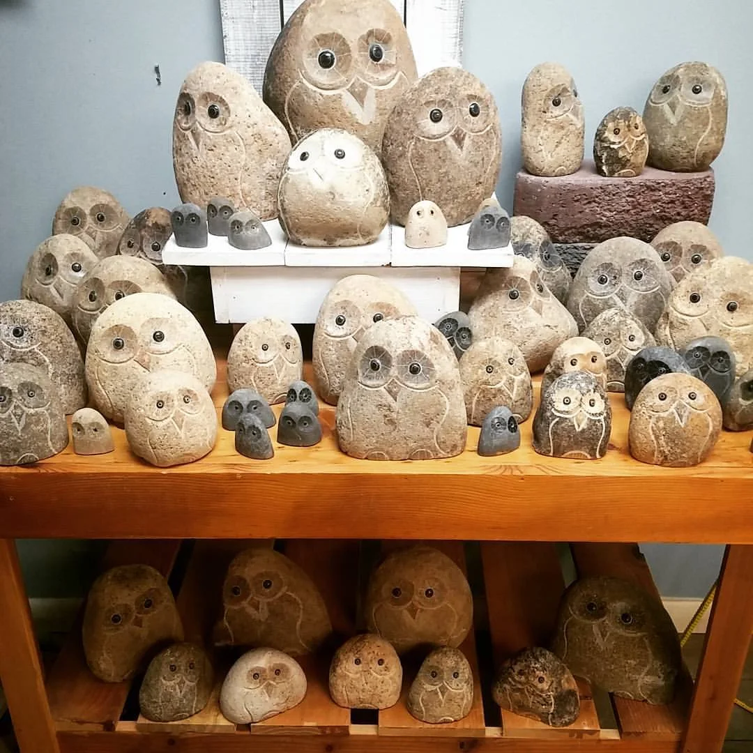Hand carved stone owls make great garden accents.