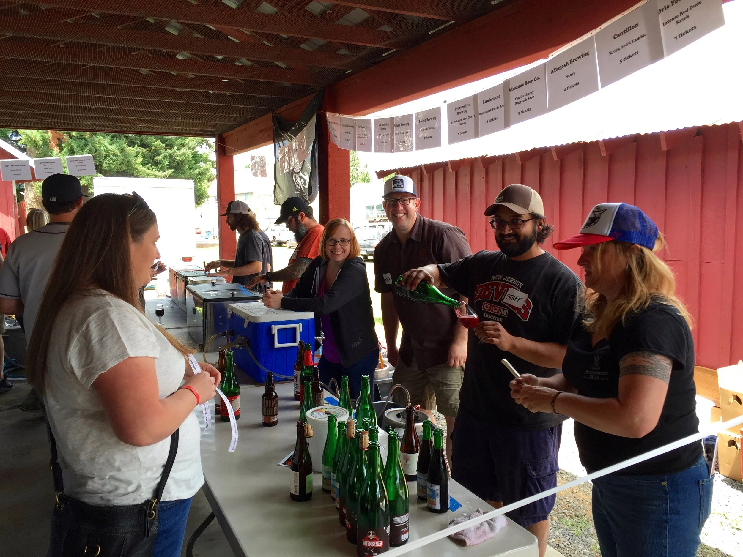 (Center) Catherine Selzer & DJ Paul of Brewpublic