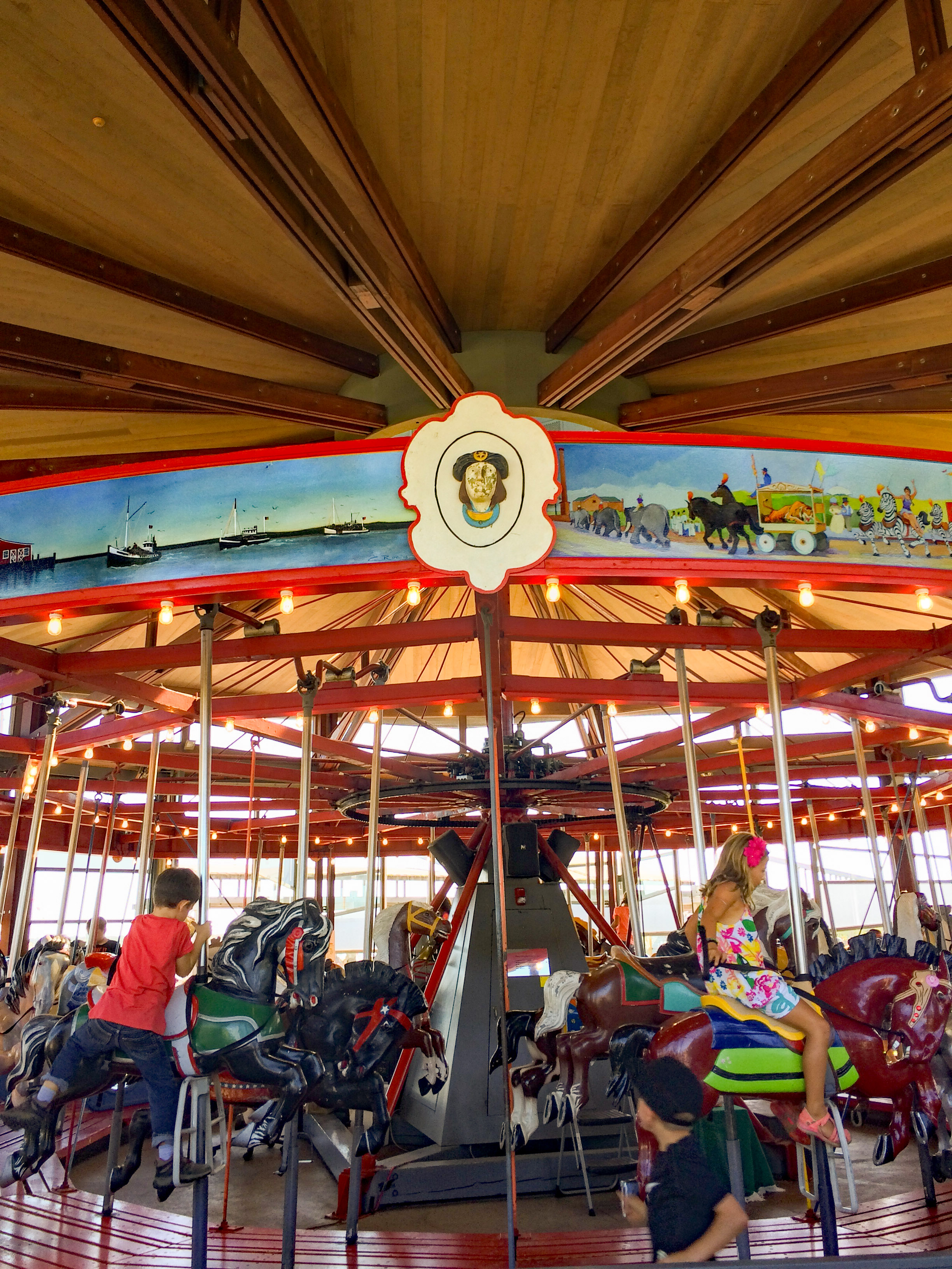 Greenport carousel riders.jpg