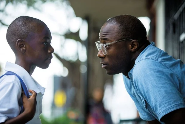 Jenkins on set with actor Alex Hibbert. Image via The Film Stage.
