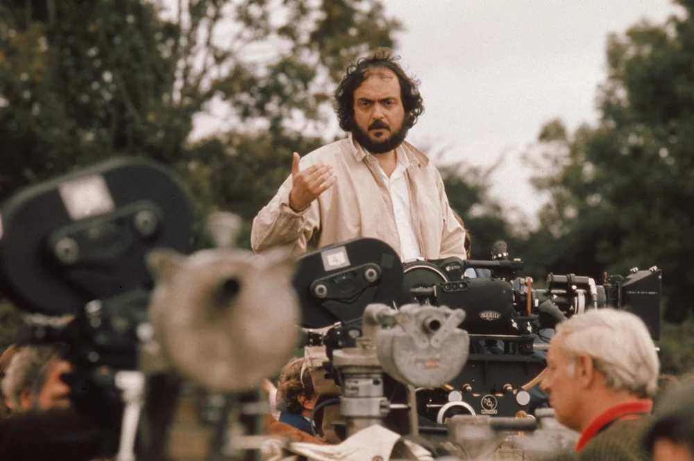 Stanley Kubrick on set, ‘Barry Lyndon.’ Image via Port Magazine .