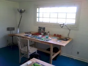 Hilary Lorenz’s studio set up. The first piece I made is a collage of cut flowers from the Italian paper with details of blue and green, seemingly the only colors of the surrounding landscape, more greens and blues than you could ever imagine go on for miles.