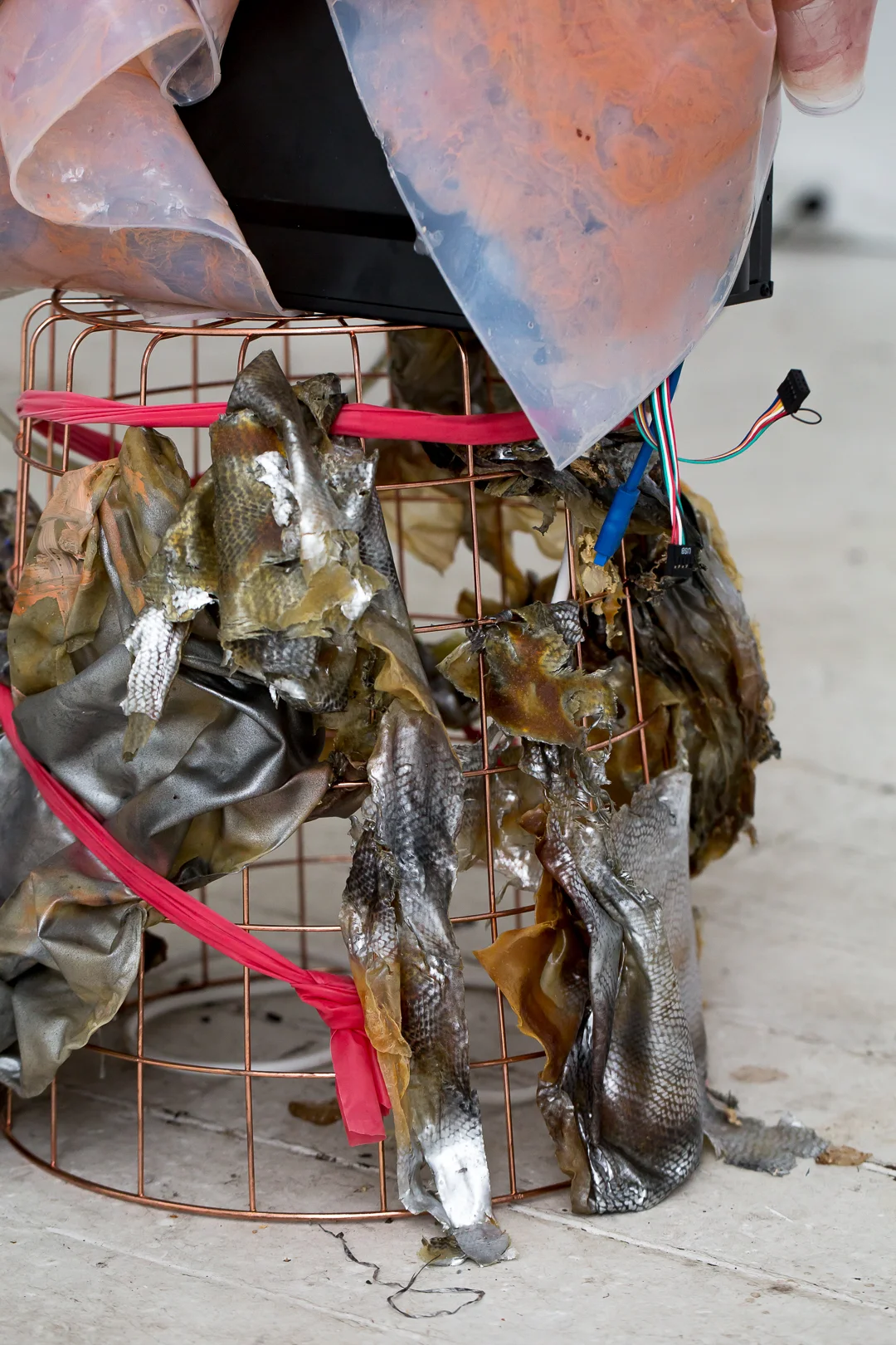 Marian Tubbs, (detail) Suprasubliminals , 2018, digital video, silicone, latex, pigment, spray paint, computer tower, waste basket, Currency, Lilac City Studio, Sydney. Photo: Document Photography