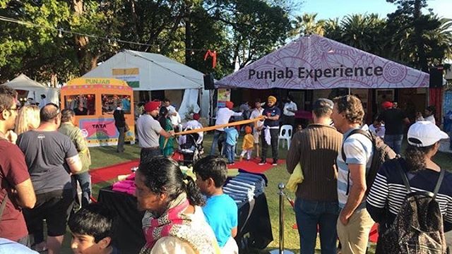 Lines are forming for turban-tying at the Punjab Experience stall! 
Come on down and give it a go!