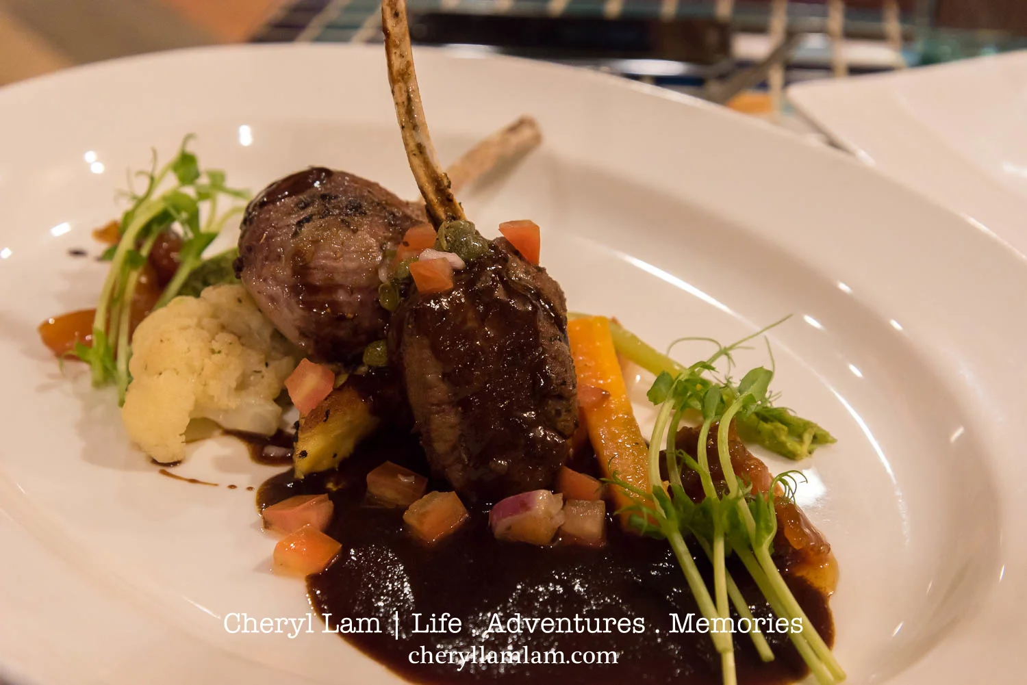 Mek Mek Mek - Australian lamb rack, Rosemary Polenta cake, Glazed market vegetables and Miso jus
