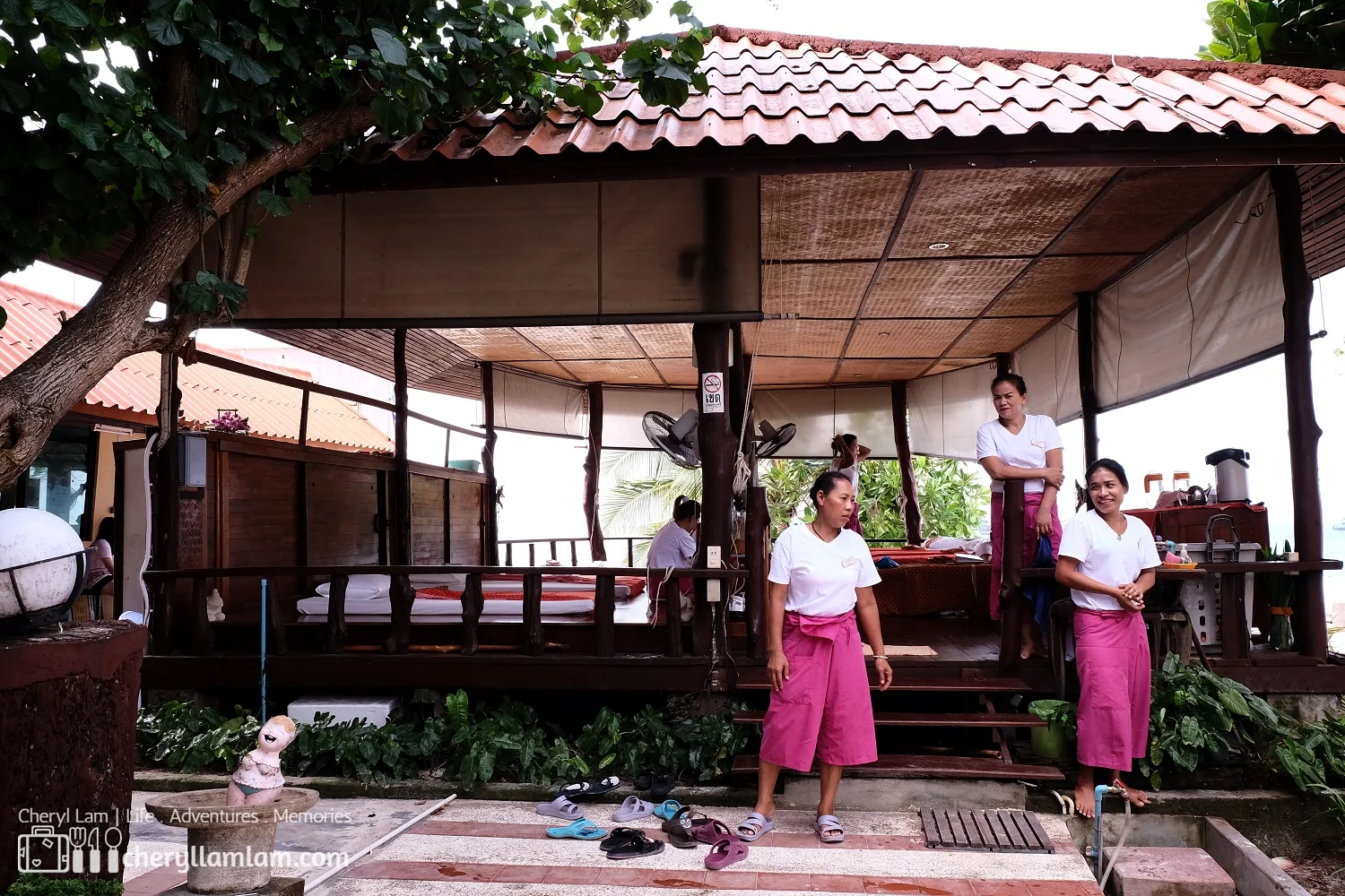 The outdoor cabana massage place. Ya is the lady at the most right.