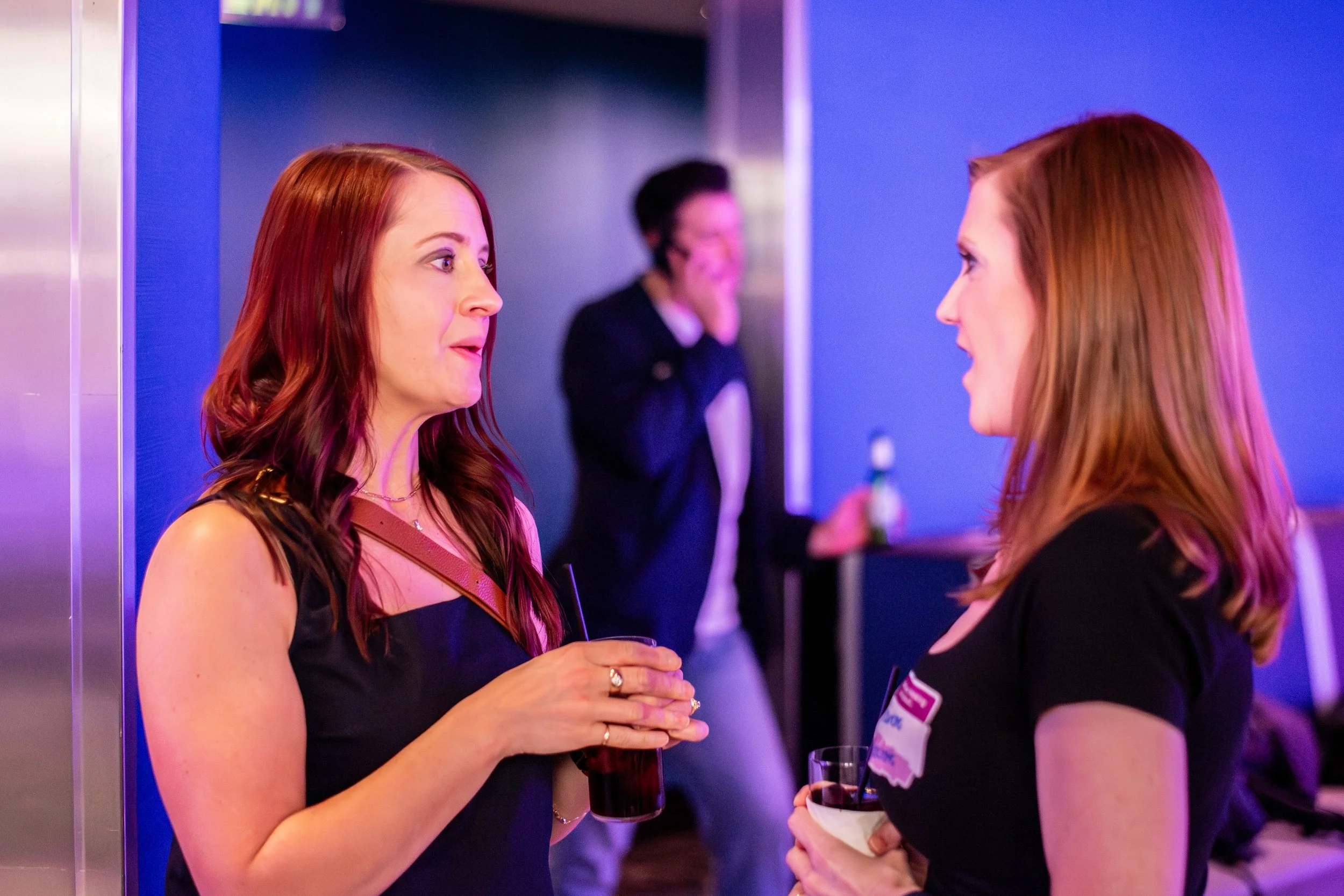 Attendees networking at the ICology Presidents Club Happy Hour at the Chandelier Bar, Cosmopolitan, Las Vegas, during Transform 2026.