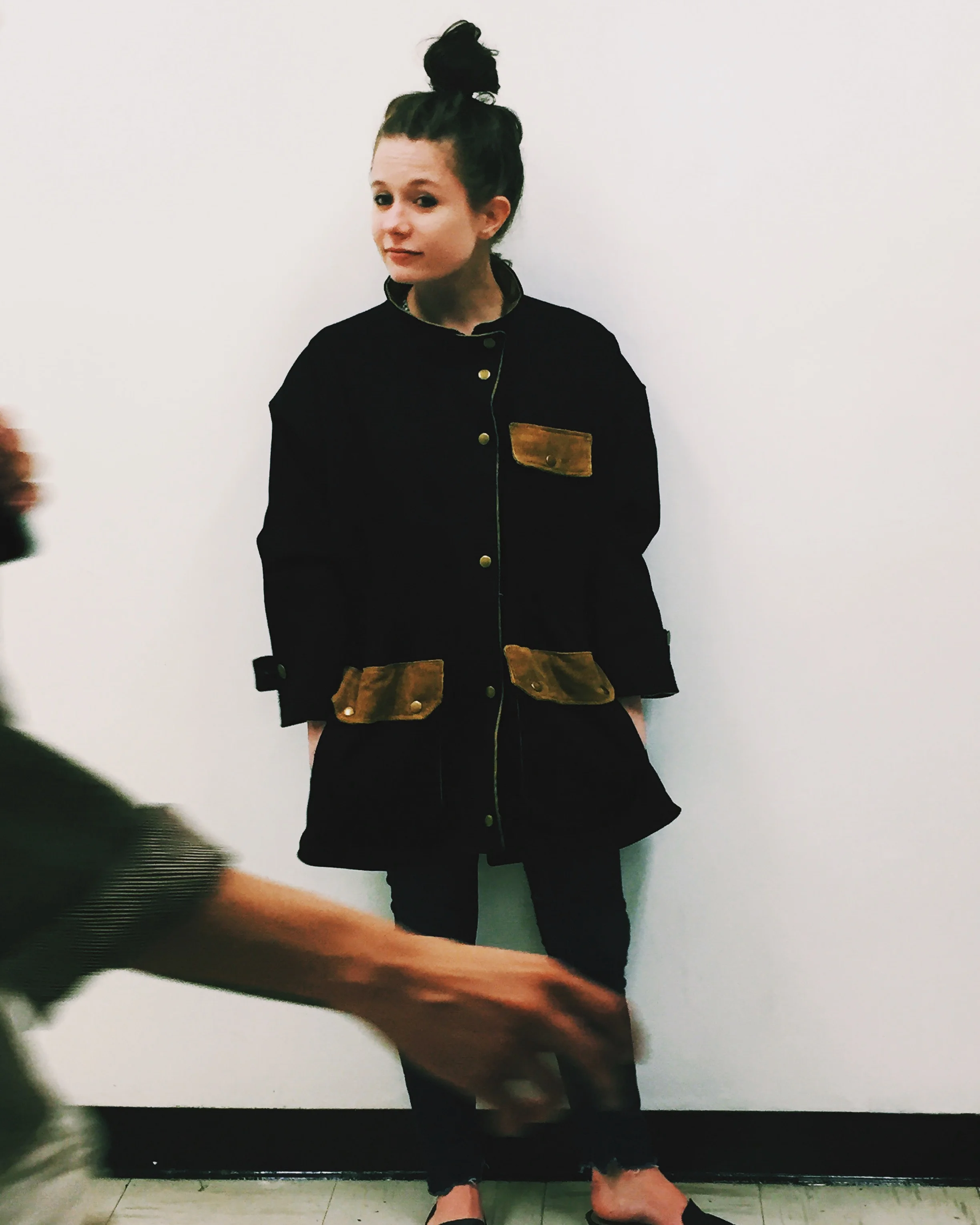  THIS IS A BLACK TWILL AND GOLD CORDUROY UTILITARIAN STYLE JACKET. IT HAS DOUBLE ENTRY POCKETS WITH SNAP CLOSURES; SNAP FRONT WITH BRASS ZIPPER UNDER, INTERIOR AND EXTERIOR DRAWSTRINGS AND CLOSURES AT THE WRIST TO TIGHTEN,&nbsp; 