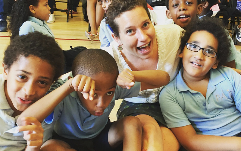 Ann Davis, founder of Venture with Impact, with her second graders in Brooklyn, NY
