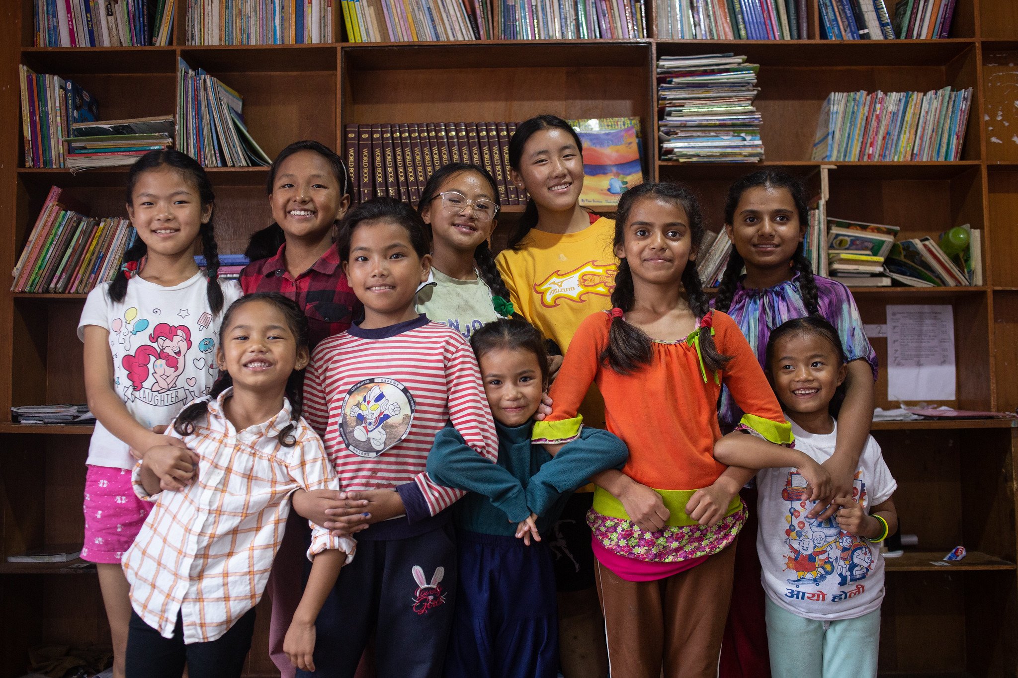  Girls are in their hostel library at Kathmandu. The Small World provides support for their education and accommodation. (Photo by Uma Bista) 