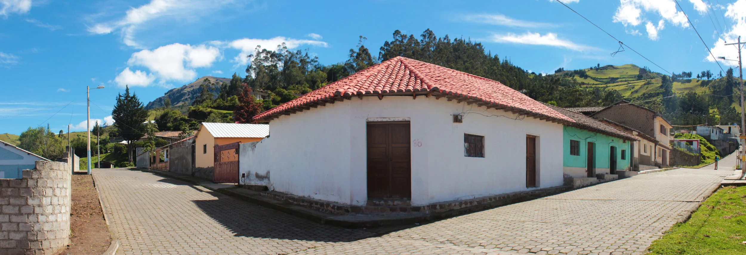 Looking out the front door of Llullu Llama at the bustling village.