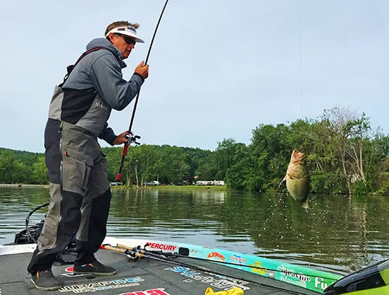 Beneath the boat is a mother lode of largemouth hiding in thick milfoil.