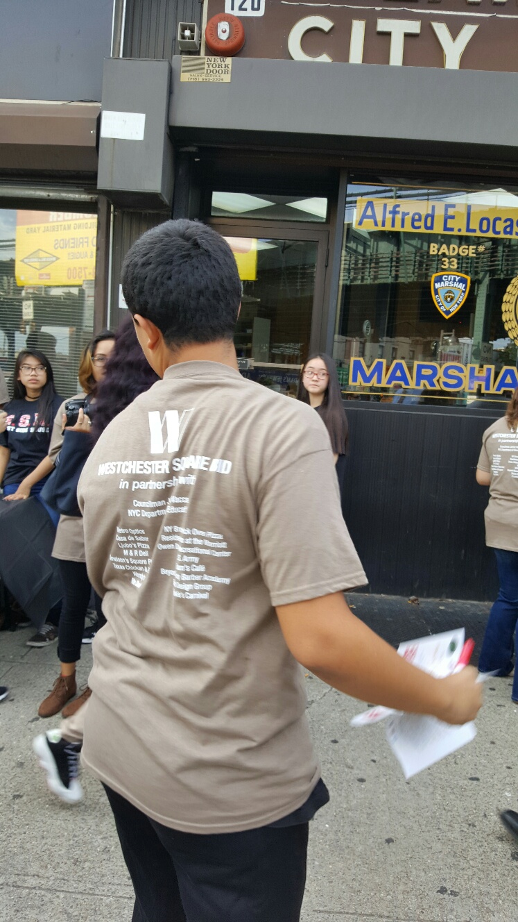 Lehman Campus student handing out goodies to fellow students. Thank you to our event sponsors.