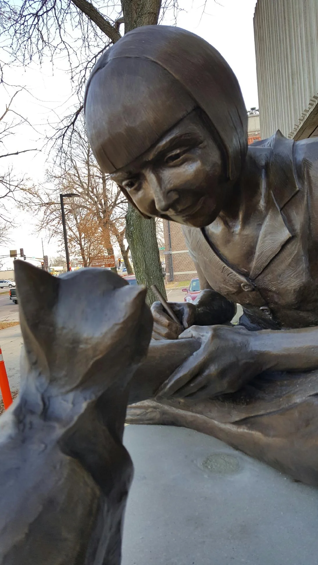 Wanda Gag Monument, New Ulm, MN, bronze and cast stone, life-sized.