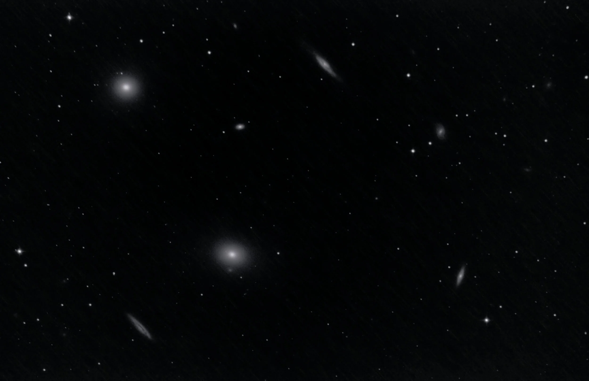 Any kind of faint glow or 'fuzzier than the others" star is a galaxy in this shot. This is 42 15-second exposures; about 10 min total.