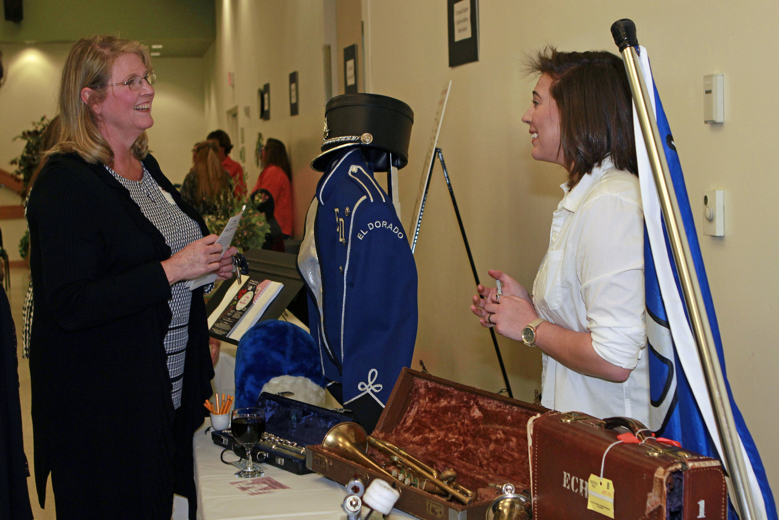 Photo 3_ EDHS Drum Major, Audrey ODonnell, shares the need for replacement musical instruments with a WFED member..jpg