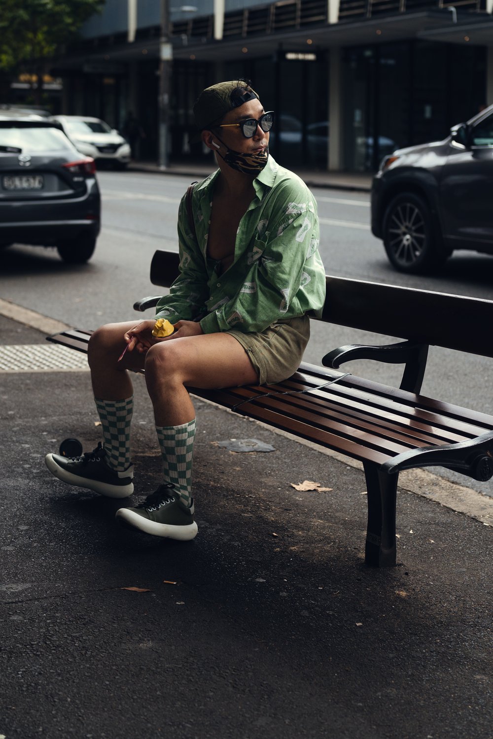 men's street style, fashion, sunglasses, green shirt with flower print, checkered socks