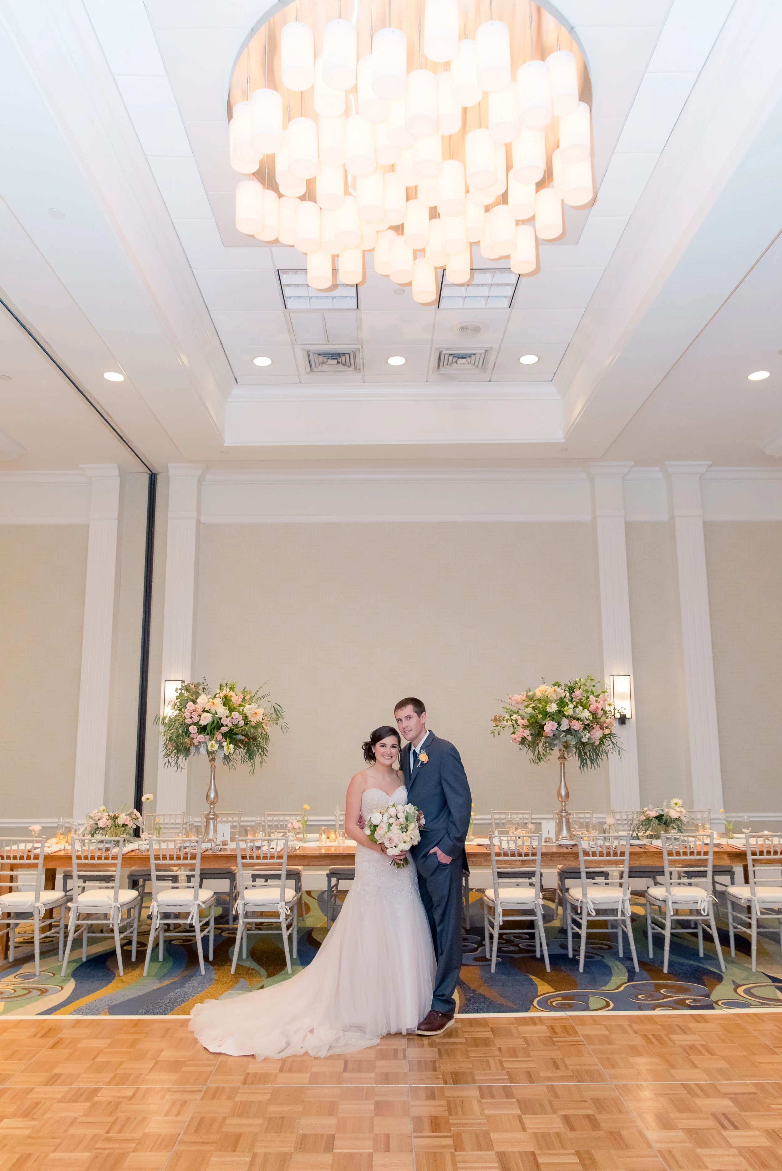 Marisa and Will | Hyatt Newport, RI Event Design: www.champagneandink.com Photo: Brittany Adams Photography | www.brittanyadams.net Floral Design: Greenlion Design | www.greenliondesign.com #newportri #newportwedding #hyattnewport #navywedding #navyandblush #fallwedding #vineyardwedding #wedding #navybridesmaid #champagneandink #greenliondesign #weddingdress #ballroom