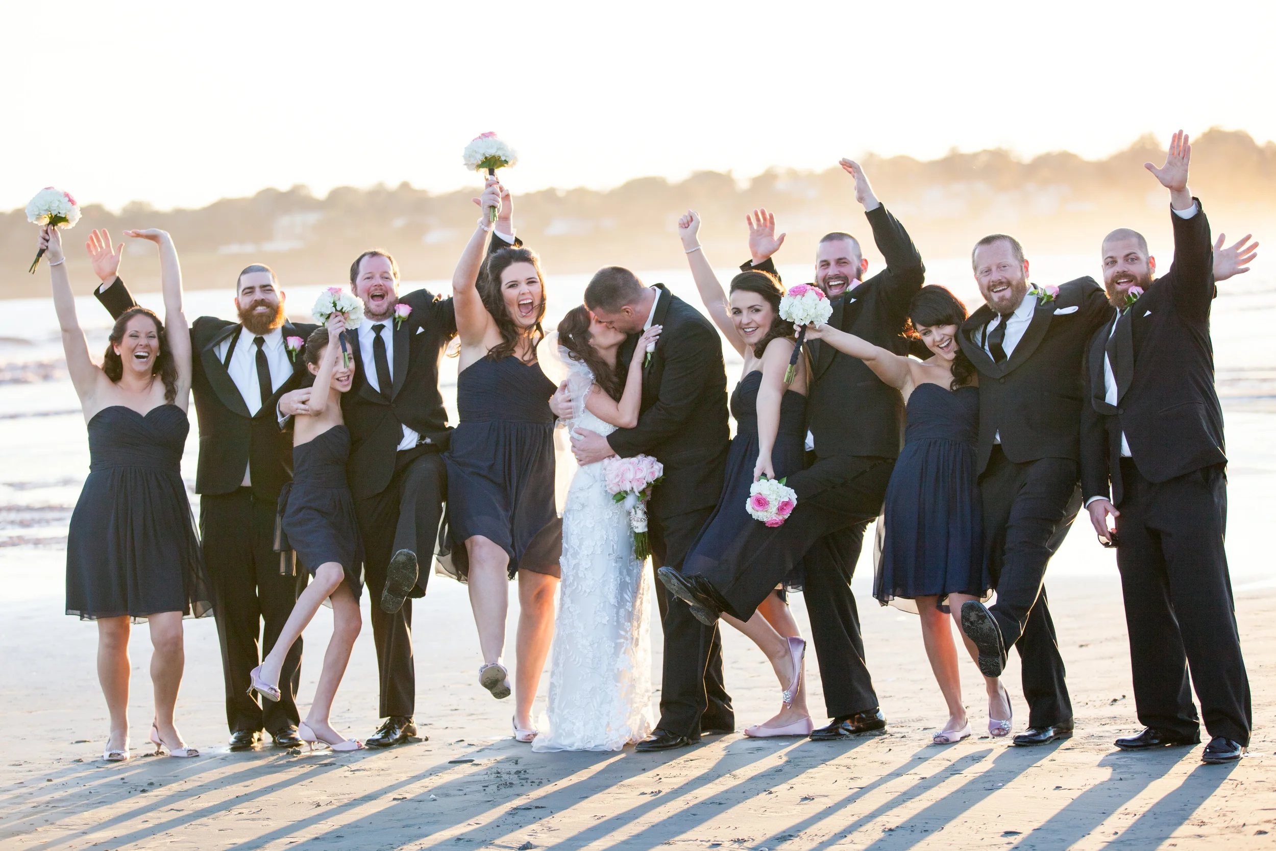 Ashley and Chuck | Atlantic Beach Club, Newport RI Event Design: www.champagneandink.com Photo: Joseph Laurin Photography | http://www.joelaurinphotography.com/ #newportri #newportwedding #champagneandink #joelaurin #bride #groom #pinkandnavy #beachwedding #wedding #weddingdress #weddingparty #groupshot #navybridesmaids #blacksuit