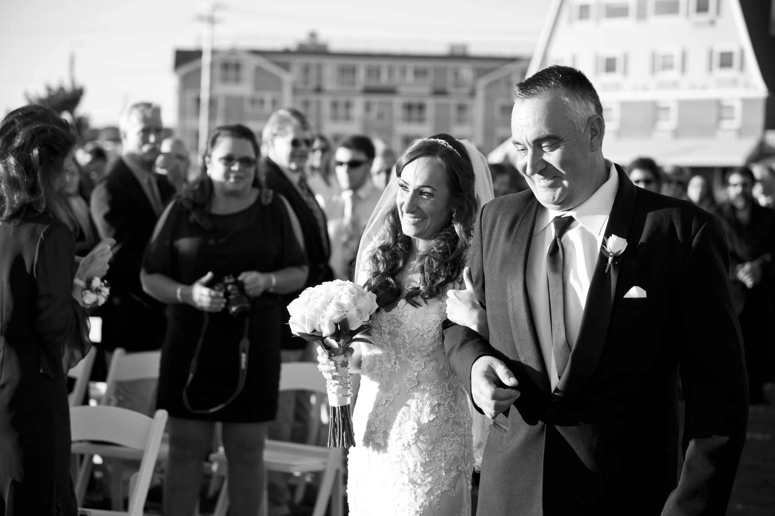 Ashley and Chuck | Atlantic Beach Club, Newport RI Event Design: www.champagneandink.com Photo: Joseph Laurin Photography | http://www.joelaurinphotography.com/ #newportri #newportwedding #champagneandink #joelaurin #centerpieces #bride #groom #pinkandnavy #beachwedding #wedding #weddingdress #weddingaisle 