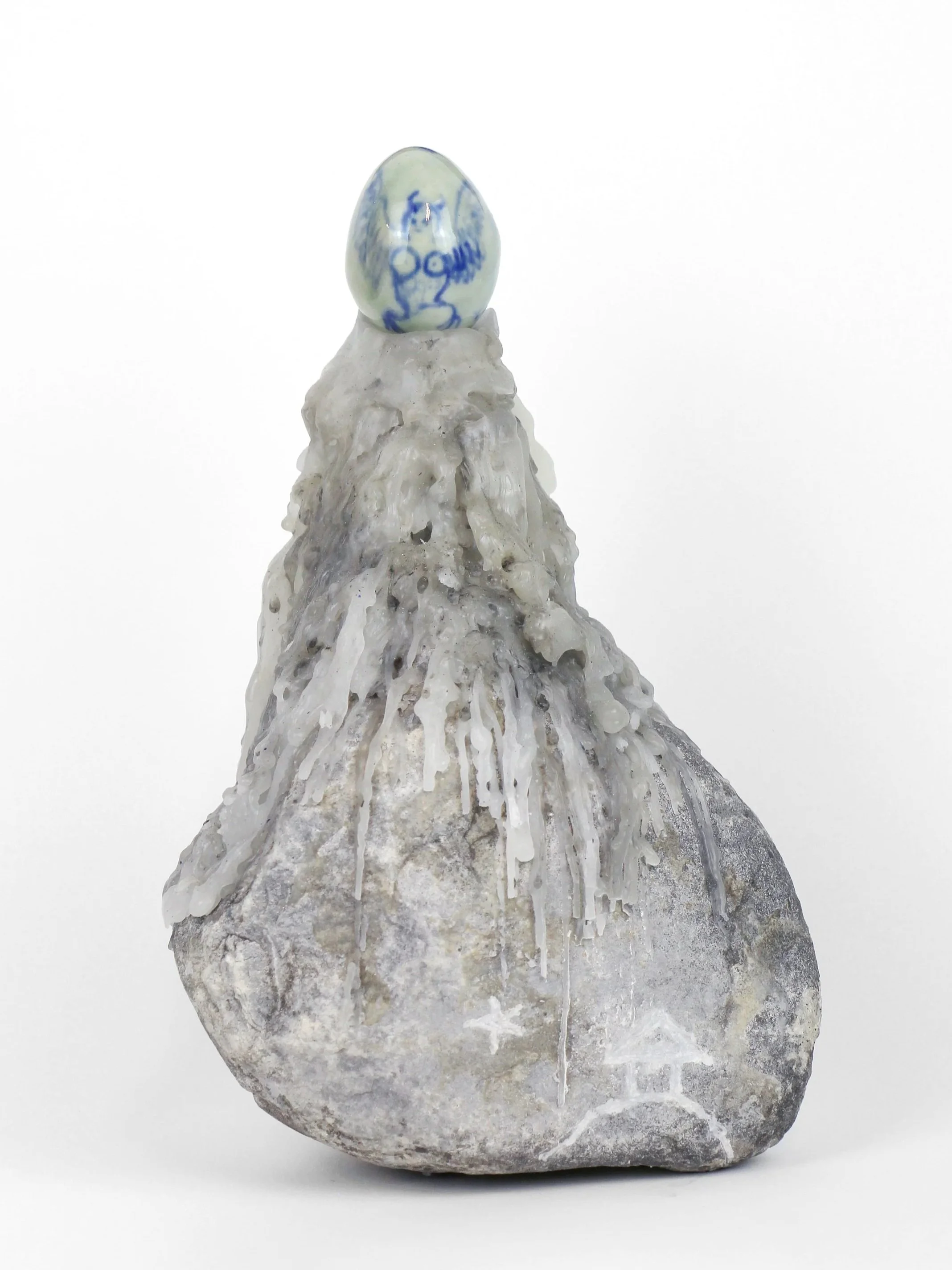 2025 Glazed porcelain, found stone, and candles