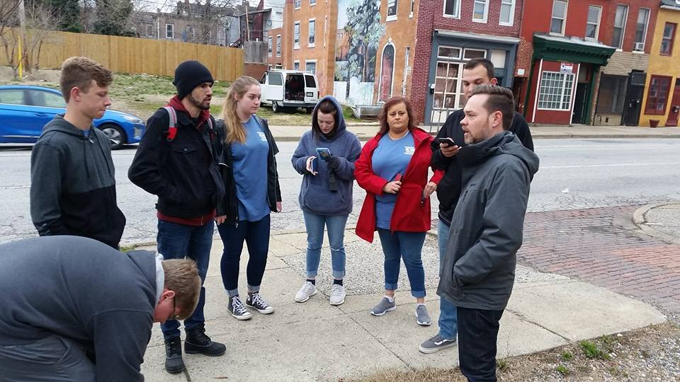 church+in+baltimore+praying+for+their+neighborhood.jpg