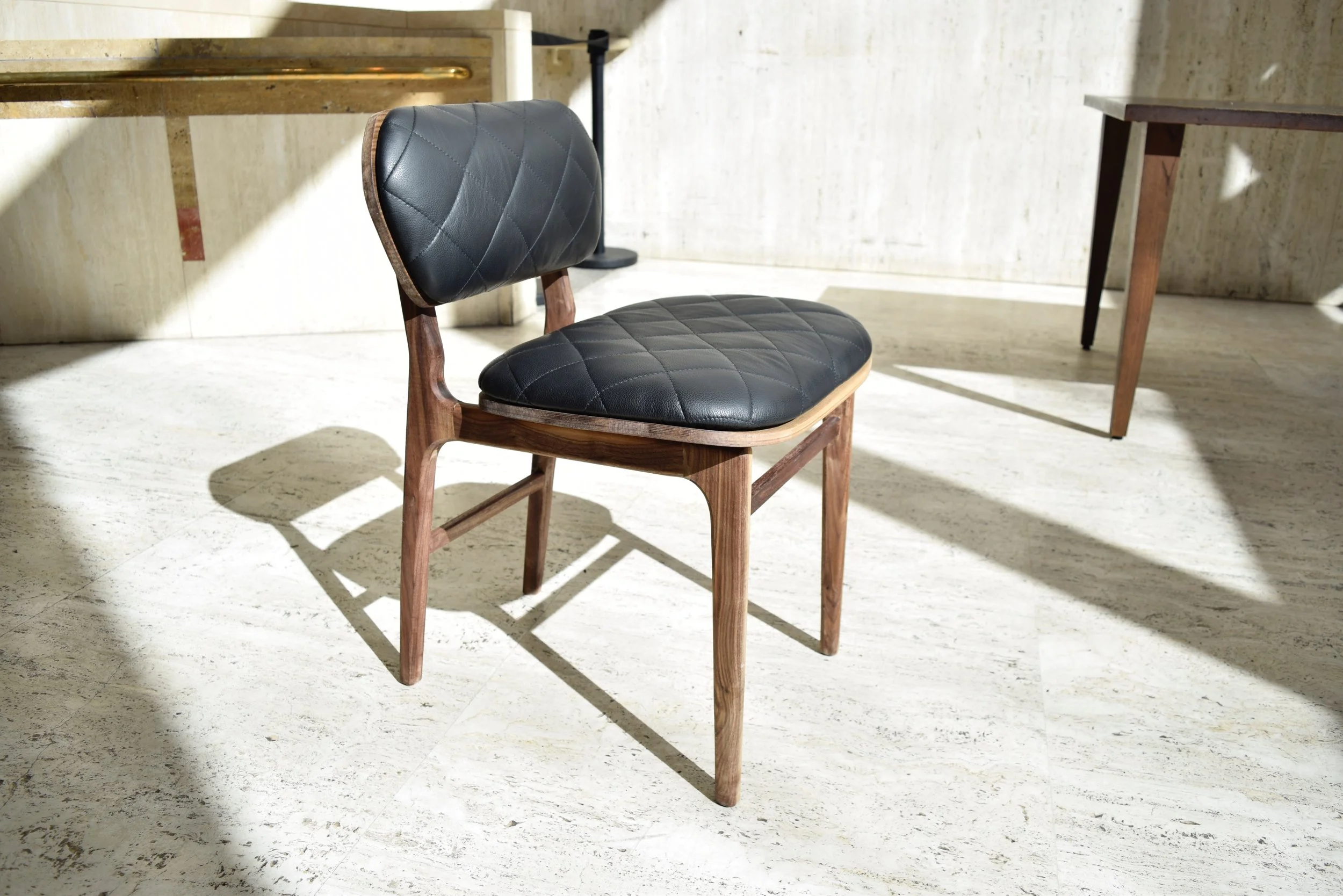 Cafe Chair (2017) / leather, foam, walnut wood, walnut veneer