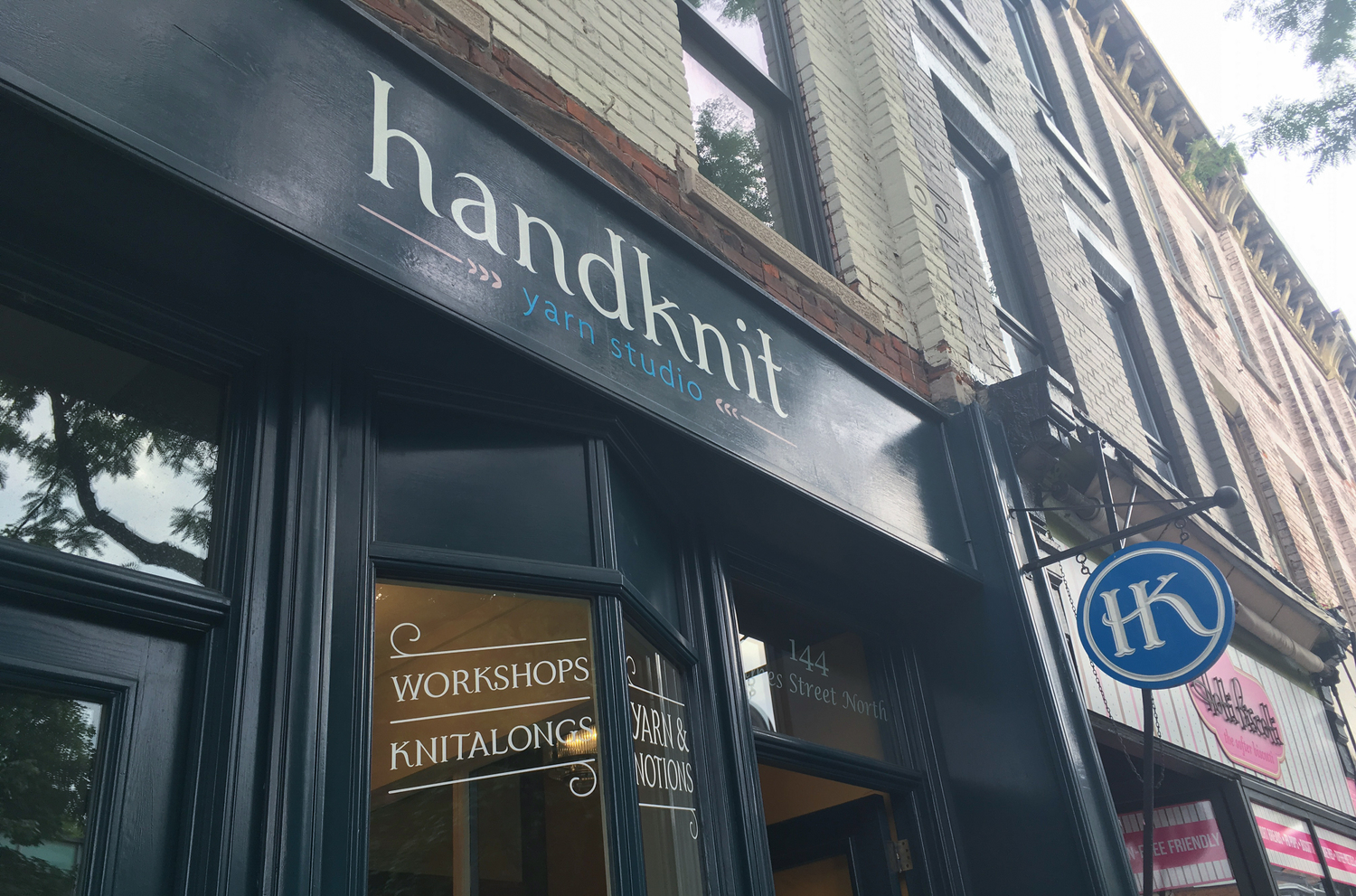 The monogram is used throughout as a custom hang sign, behind the cash register, social media accounts and even makes an appearance on their small branded stitch markers. I designed the brand with these smaller applications in mind so that it could gracefully scale down.