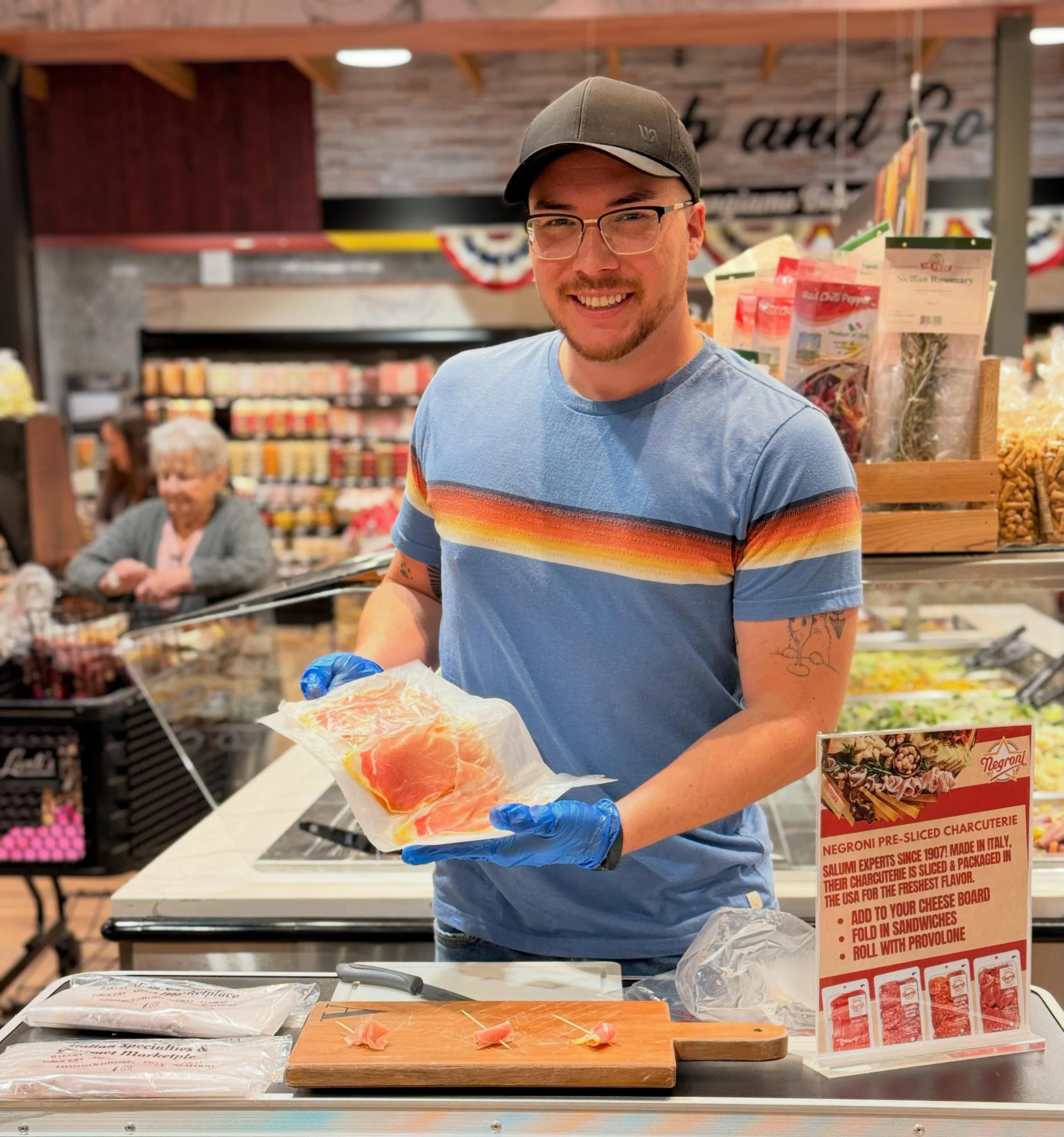 Alex showcasing @negronisalumi prosciutto di Parma with @muscofoodcorp at @livotisoldworldmarket #brick #newjersey #alexrobillc