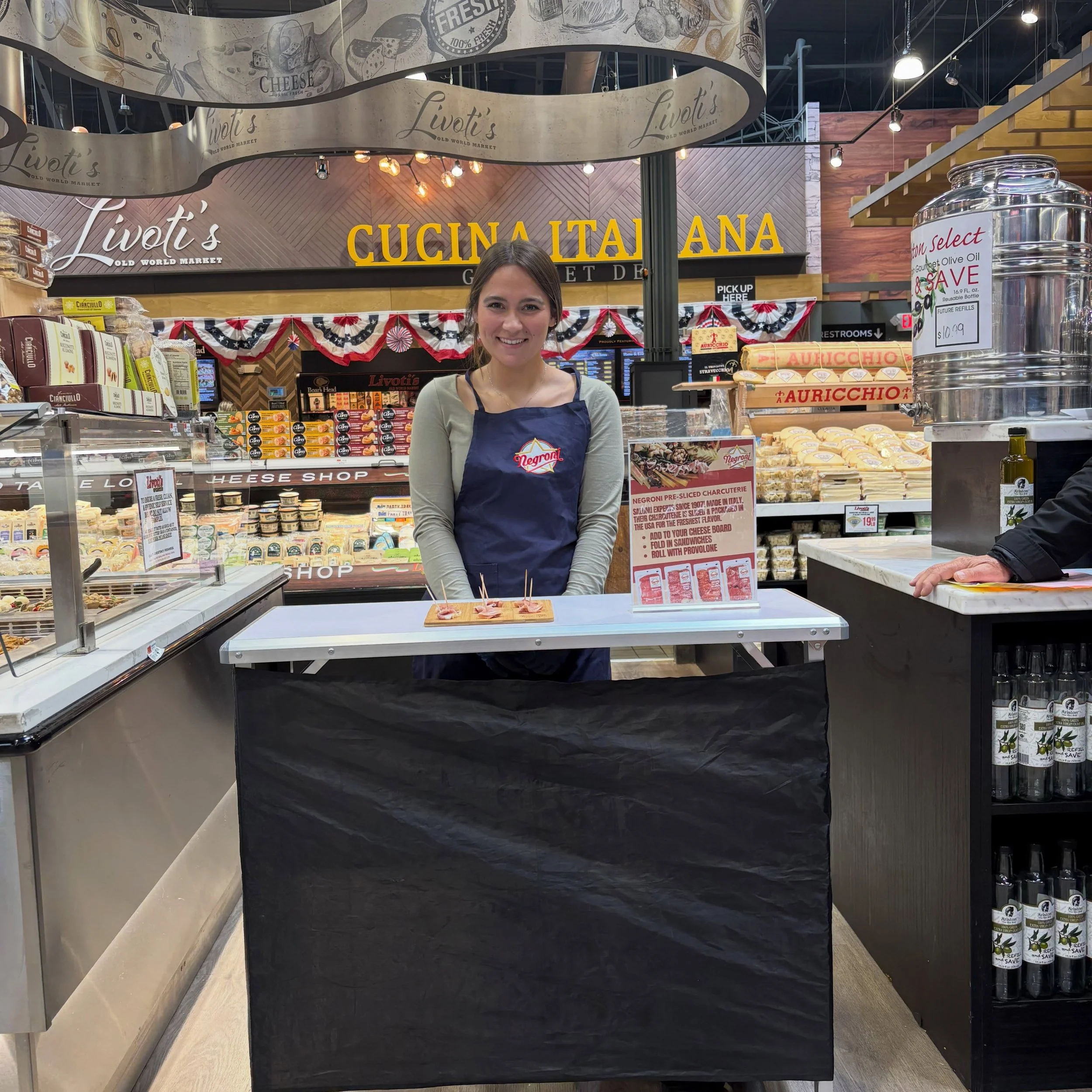 Nicole showcasing @muscofoodcorp @negronisalumi prosciutto at @livotisoldworldmarket #freehold #newjersey #alexrobillc