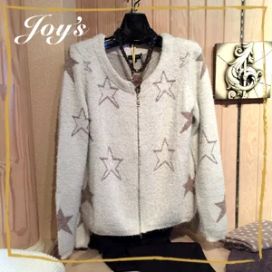 Tricotto | Star Sweater | $135 European in style and superior-quality, Tricotto is distinctive thanks to its variety of avant-garde items and its quick and unique read of the latest international fashion trends. Feel and look your best in this comfy styled, front-zipped sweater.