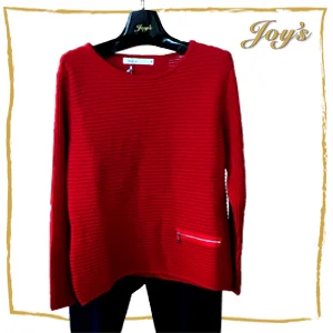 Skovhuus | Red Pullover Sweater | $130 An all-around stunner, this classic pullover offers the perfect fit with trendy front zipper accent for just the right style.