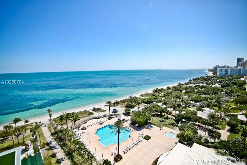 EWM's Riley Smith and Maria Loughlin Close Record Sale At Oceana Key