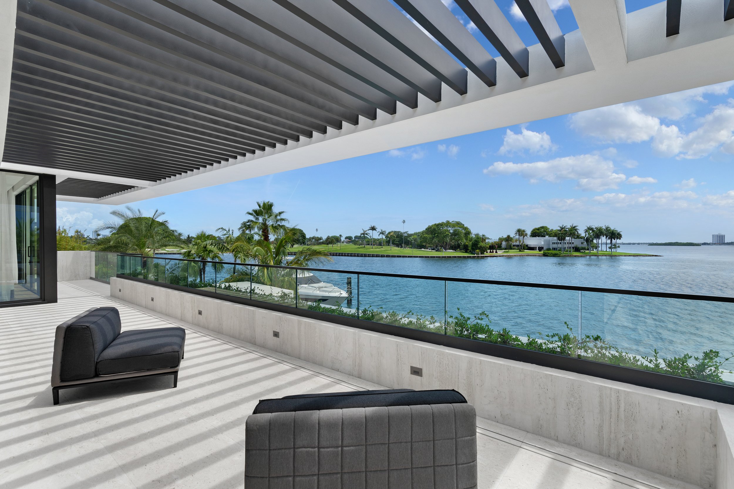 Check Out The Tropical Modern Waterfront On Bay Harbor Islands Asking $22.95 Million 11.jpg