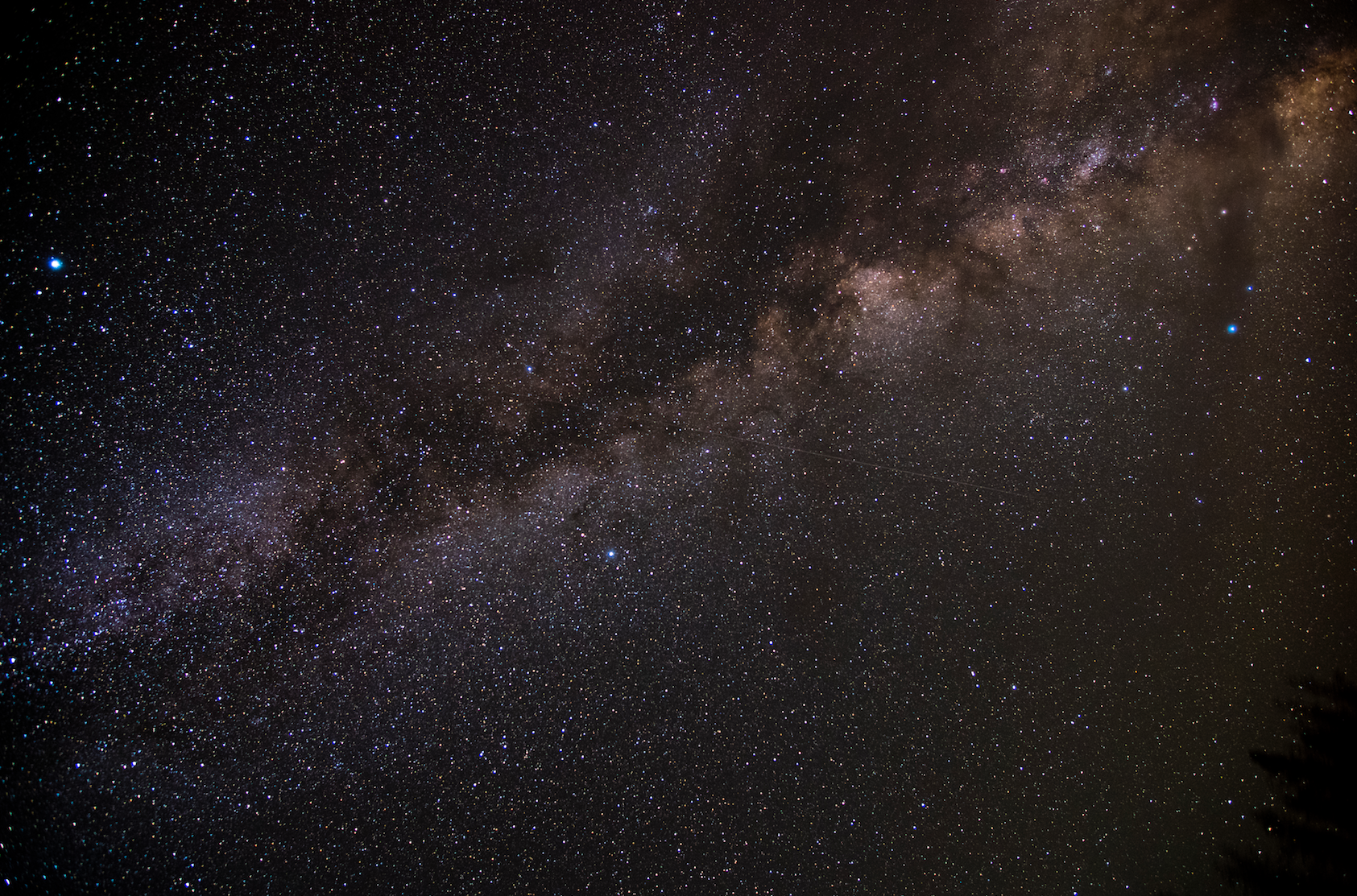 Karen Adair stunning long exposure of insane Milky Way at our 9000 ft camp. A verrrry faint meteor can be seen crossing center. 