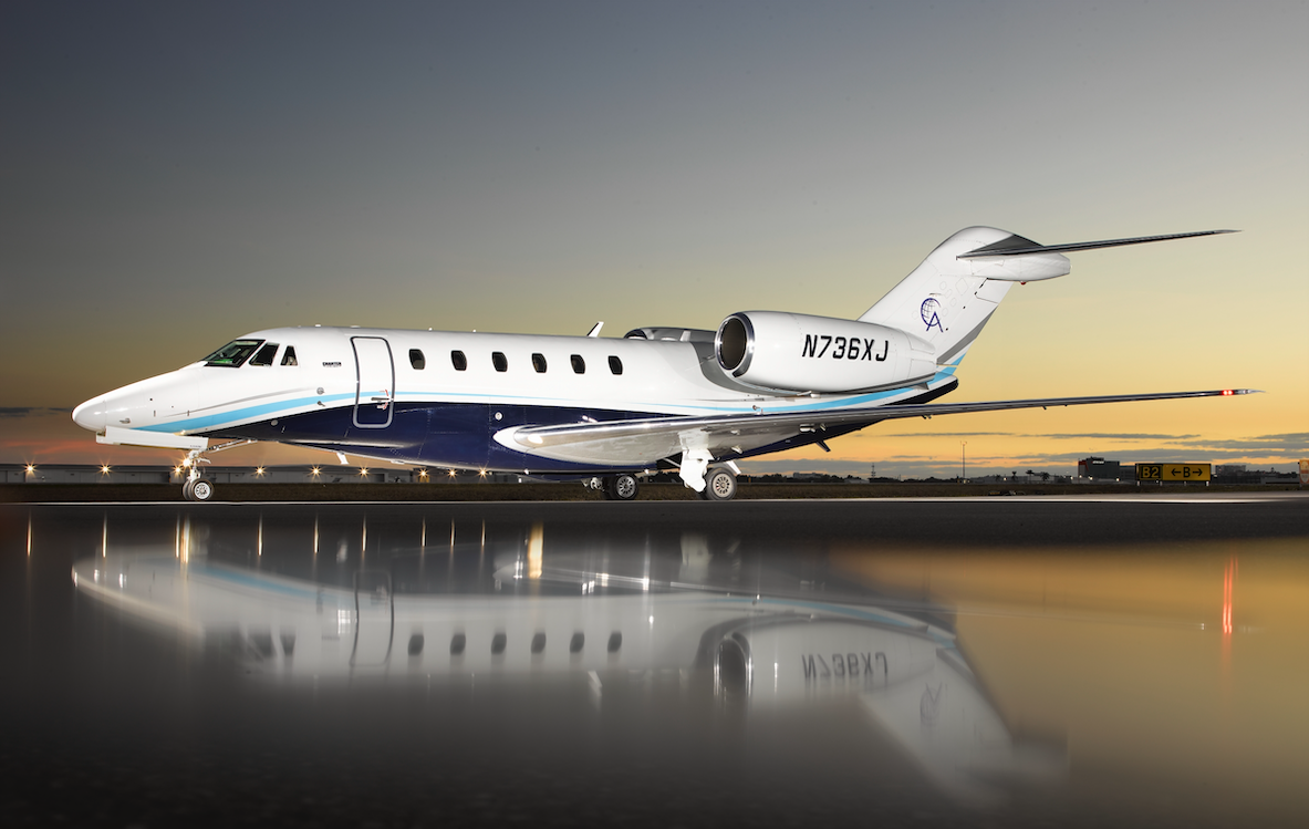 Citation X N736XJ sitting on the ramp on a beautiful morning in FXE.