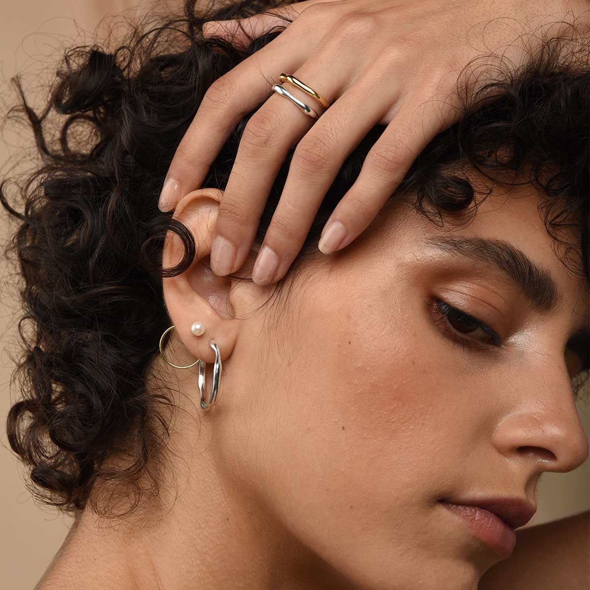 Baroque_bands_coil_stud_and_baroque_hoop_on_model_for_web_ea470694-396b-4c58-ab64-e8c9679165e4_1600x.jpg