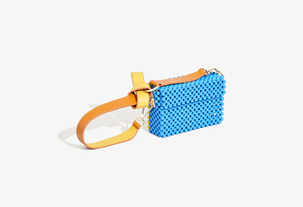 Metamorphosis Cocktail Clutch with Tan & Turmeric Handle.jpg