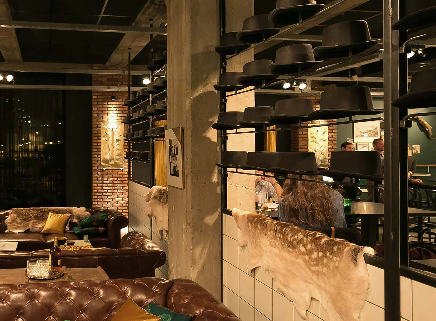Kaaiman is a pop-up bar/restaurant seating up to 94 guests located in Hasselt, Belgium. The venue radiates a warm, intimate ambience given by its former background as a grain store. Its mission is to provide the clientele with a relaxed yet refined atmosphere that takes shared dining to another level.
