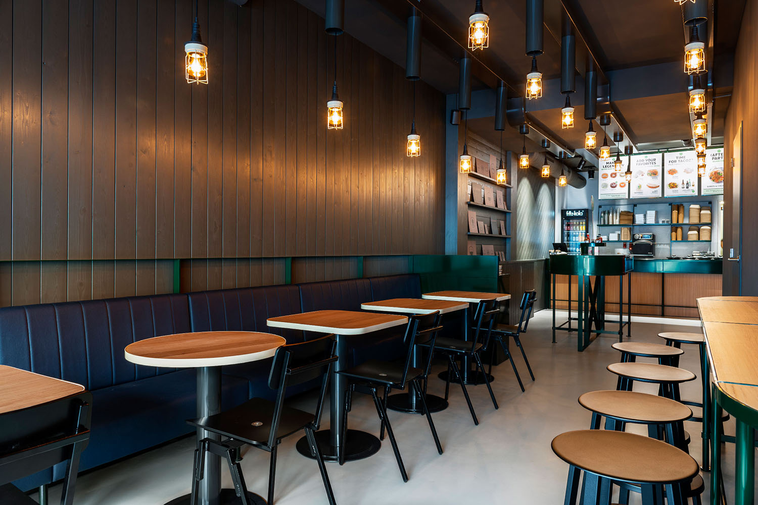 The wooden panels and furniture stitching complement each other